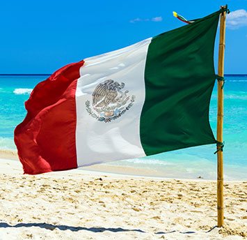 Mexico Flag on the Beach